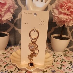 a new day Gold and Pearl Bag Charm